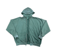 a green hooded sweatshirt on a black background